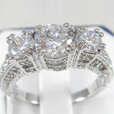 Emerald-Green Round CZ Three-Stone Pave Ring