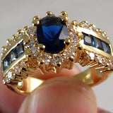 Sapphire-Blue Oval Channel Baguette Gold Ring