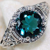 Teal-Blue Round CZ Filigree Halo Ring