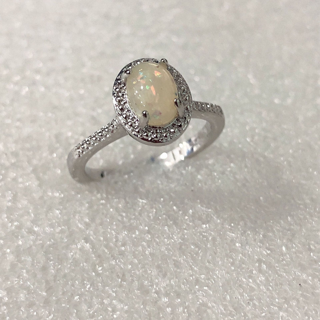 Small Opal-Look Oval Halo Ring