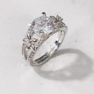 Round CZ Star Flower Accent Solitaire Ring