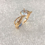 Clear CZ Solitaire Twisted Gold Ring