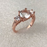 Round CZ Three-Stone Rose-Tone Ring