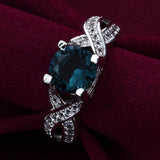 London-Blue Round CZ Twisted Shank Ring