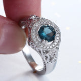 London-Blue Round CZ Ornate Halo Ring