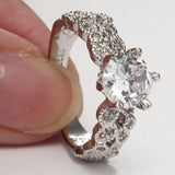 Round CZ Solitaire Twisted Pave Shank Ring