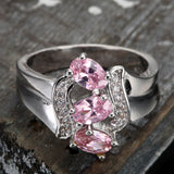 Pink Oval CZ Three-Stone Diagonal Ring