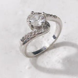 Clear Round CZ Bypass Swirl Ring