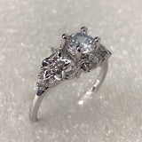 Round CZ Floral Gallery Solitaire Ring