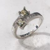 Olive-Green Square CZ Two-Stone Bypass Ring