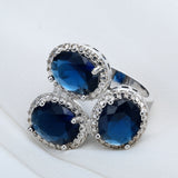 Sapphire-Blue Oval CZ Triple Halo Ring