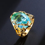 Aqua Oval CZ Molten Gold Statement Ring
