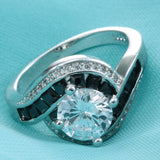 Round CZ Solitaire Black Channel Swirl Ring