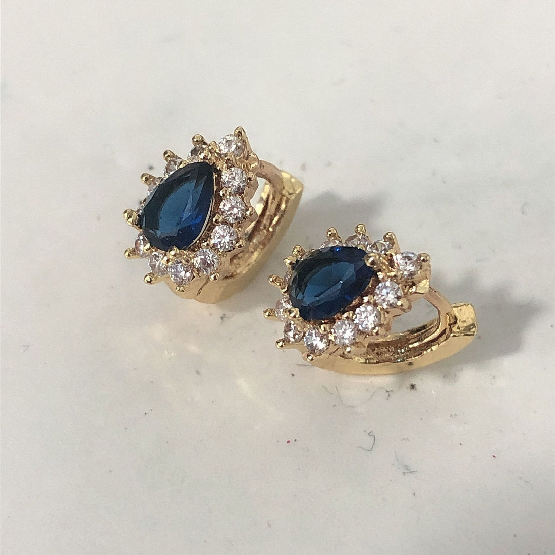 Sapphire-Blue Pear CZ Halo Huggie Earrings