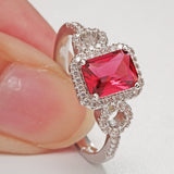 Ruby-Red Emerald-Cut CZ Halo Ring