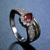 Ruby-Red Pear CZ Halo Crossover Ring