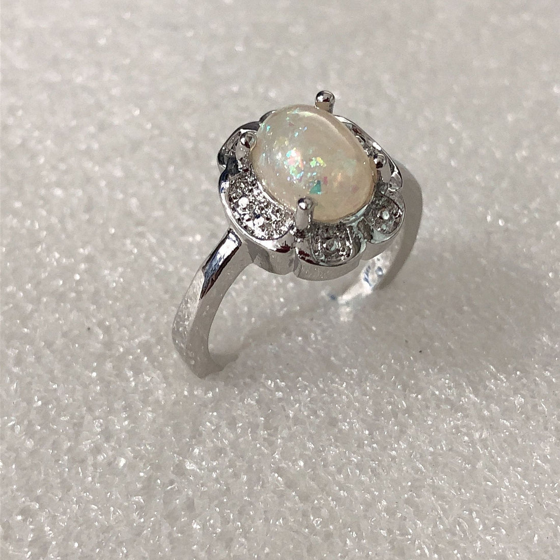 Opal-Look Oval Scalloped CZ Halo Ring