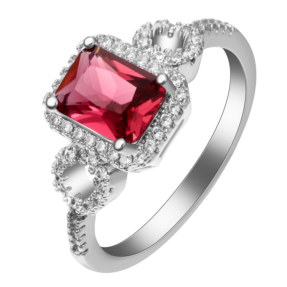 Ruby-Red Emerald-Cut CZ Halo Ring