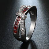 Garnet-Red Channel CZ Crisscross Bow Ring