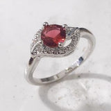 Red Oval CZ Swirl Halo Ring
