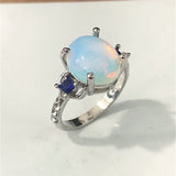 Moonstone-Look Oval Blue CZ Side Stone Ring