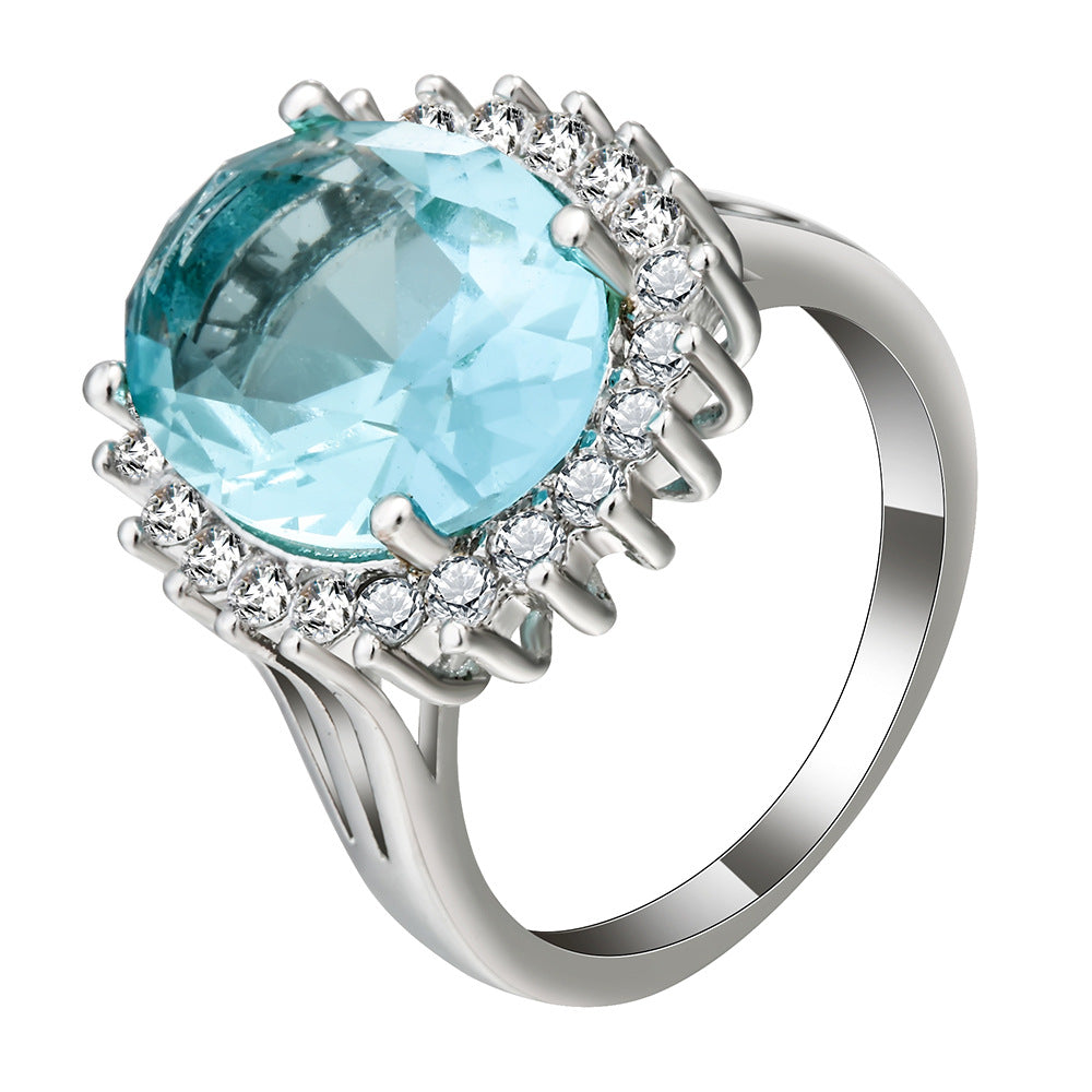 Aqua Oval CZ Sunburst Halo Ring