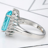Aqua Oval CZ Sunburst Halo Ring