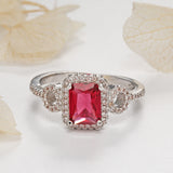 Ruby-Red Emerald-Cut CZ Halo Ring