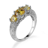 Emerald-Green Round CZ Three-Stone Pave Ring