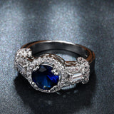 Sapphire-Blue Oval CZ Baguette Halo Ring