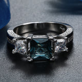 Teal Square CZ Three-Stone Ring