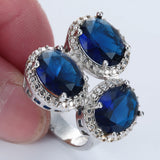 Sapphire-Blue Oval CZ Triple Halo Ring