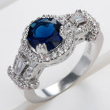 Sapphire-Blue Oval CZ Baguette Halo Ring