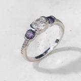 Clear and Purple Oval CZ Three-Stone Ring