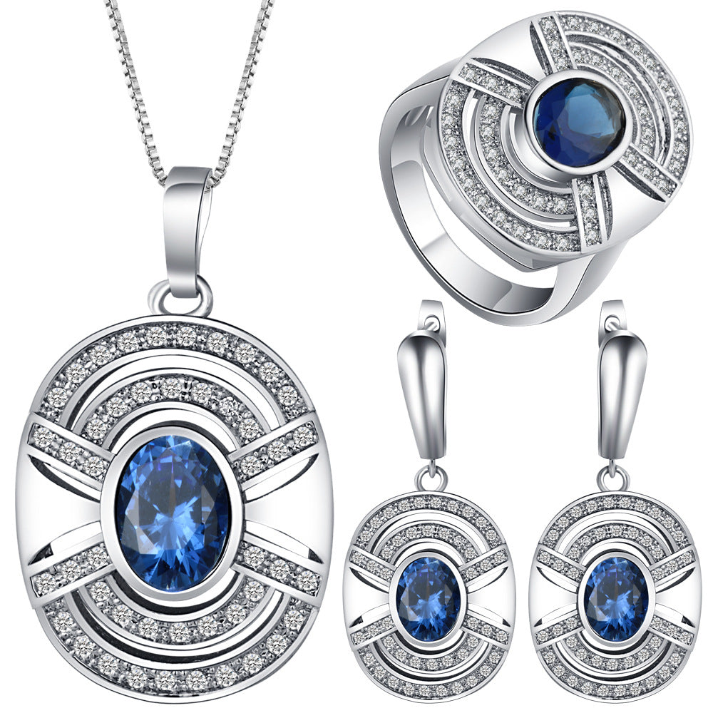 Sapphire-Blue Oval CZ Arched Halo Jewelry Set