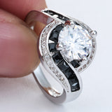 Round CZ Solitaire Black Channel Swirl Ring