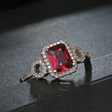 Ruby-Red Emerald-Cut CZ Halo Ring