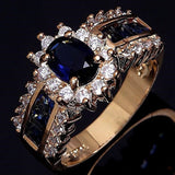 Sapphire-Blue Oval Channel Baguette Gold Ring