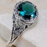Teal-Blue Round CZ Filigree Halo Ring