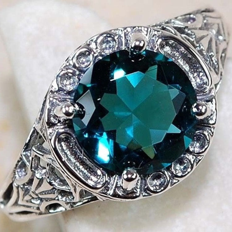 Teal-Blue Round CZ Filigree Halo Ring