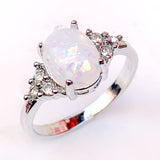 Oval Opal-Look Ring with CZ Side Clusters