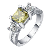 Teal Square CZ Three-Stone Ring