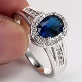 Sapphire-Blue Oval CZ Halo Split Shank Ring