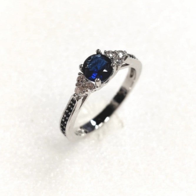 Sapphire-Blue Round CZ Black Pave Band Ring