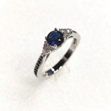 Sapphire-Blue Round CZ Black Pave Band Ring