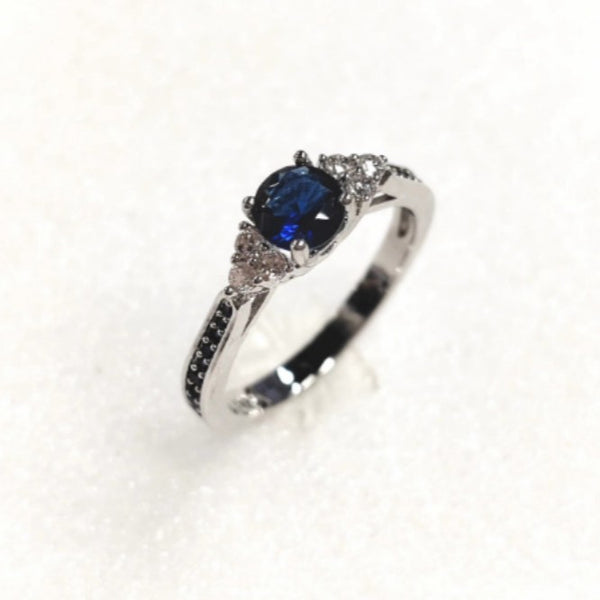 Sapphire-Blue Round CZ Black Pave Band Ring
