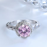 Pink Round CZ Swirl Halo Ring