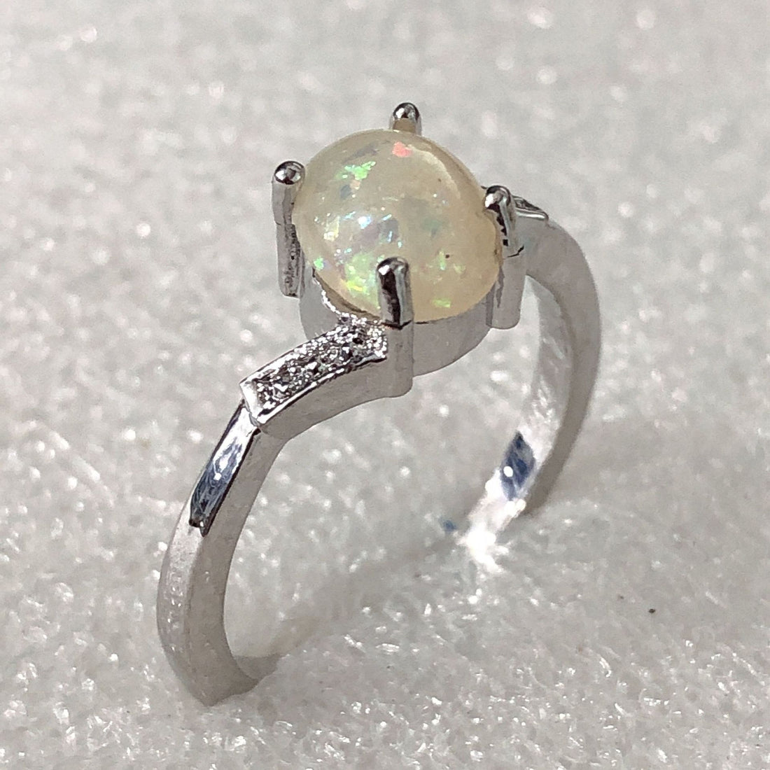 Opal-Look Round Solitaire Curved Shoulder Ring