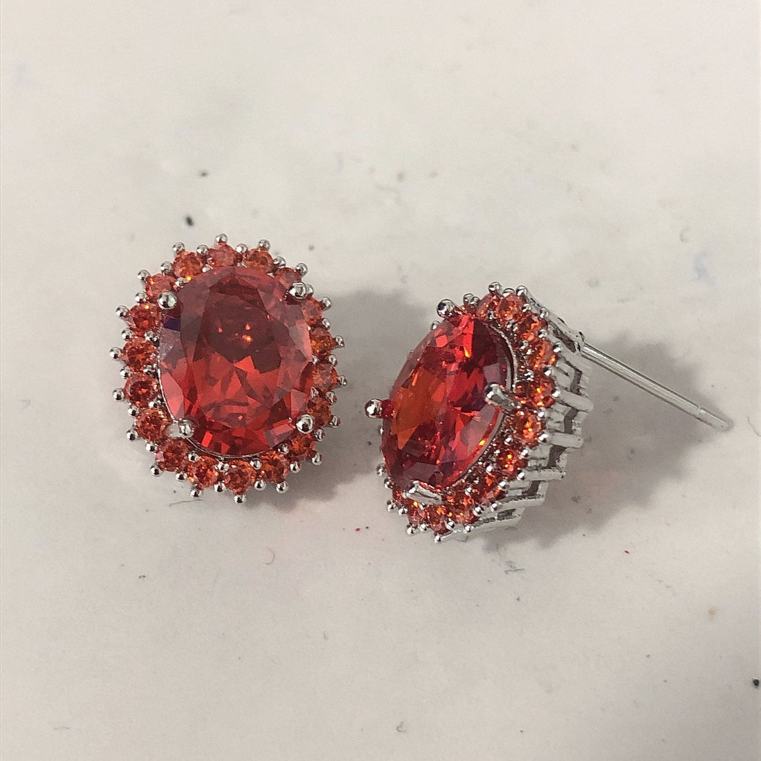 Ruby-Red Oval CZ Halo Stud Earrings