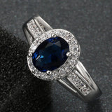 Sapphire-Blue Oval CZ Halo Split Shank Ring